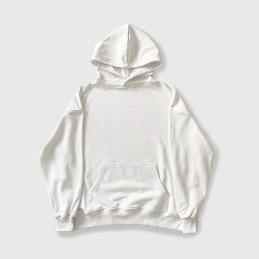 Premium oversized 100% cotton hoodie against white background.