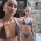 Models wearing dark brown bikini and navy blue string bikini.